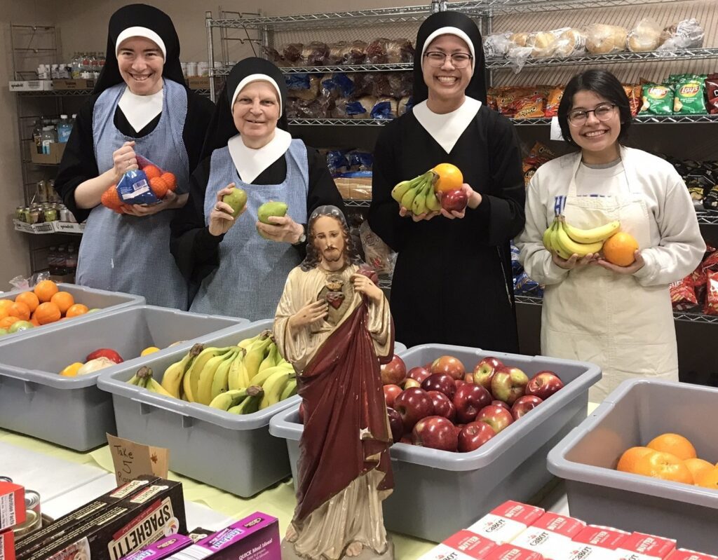 With (l. to r.) Sisters Gabriela, Joan Marie, Marie Celeste and our student, Clara, YOU are providing sustenance and hope to the families who visit our food pantry.